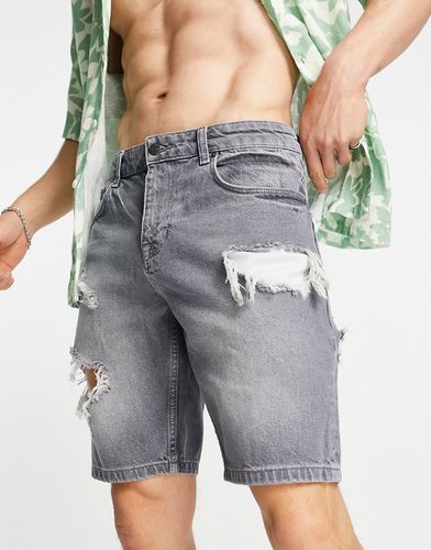 Short en jean coupe slim avec larges déchirures - délavé - Asos Design - Modalova