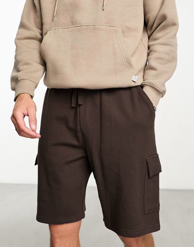 Short oversize en jersey avec poches cargo - Marron - Asos Design - Modalova