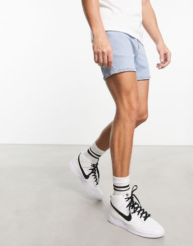 Short skinny en jean court - délavé clair - Asos Design - Modalova