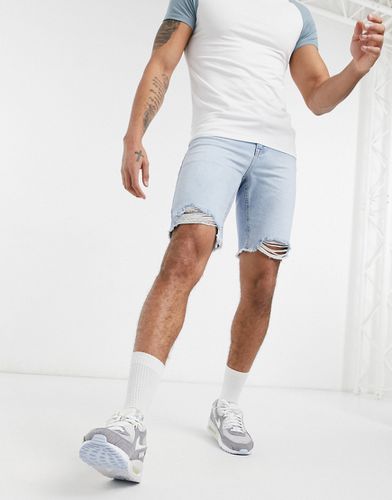 Short slim en jean avec ourlets bruts - clair délavé - Asos Design - Modalova