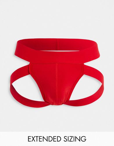 String fesses nues avec lanière sur la jambe - Asos Design - Modalova