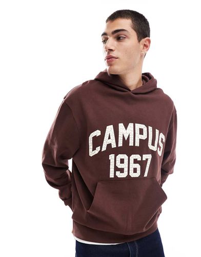 Sweat à capuche oversize à imprimé style universitaire - Asos Design - Modalova