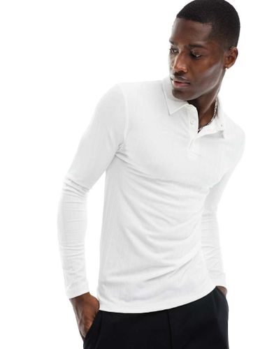 Polo moulant à manches longues - côtelé - Asos Design - Modalova