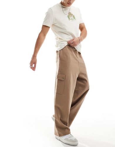 Pantalon coupe ballon avec poche cargo - Marron - Asos Design - Modalova