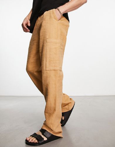 Pantalon cargo décontracté et texturé - Beige - Asos Design - Modalova