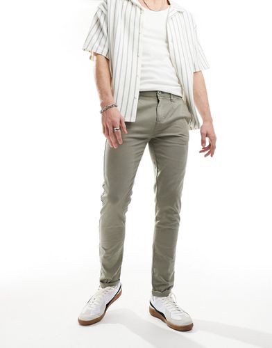 Pantalon chino ajusté - Kaki délavé - Asos Design - Modalova
