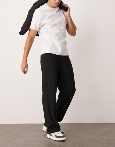 Pantalon baggy en tissu côtelé effet brossé - Anthracite - Asos Design - Modalova