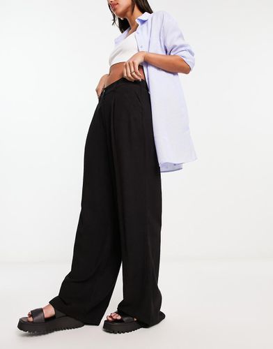 Pantalon dad ample en lin mélangé - Asos Design - Modalova