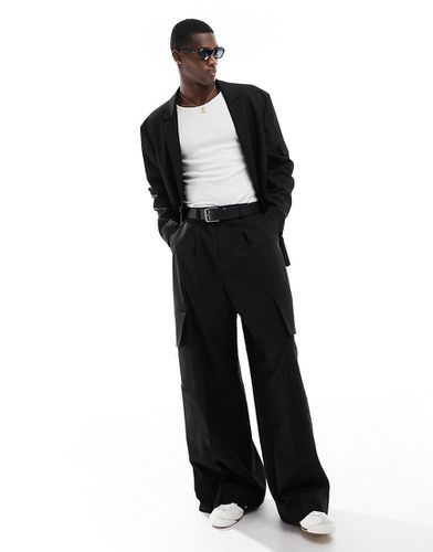 Pantalon de costume coupe cargo ultra large - Asos Design - Modalova
