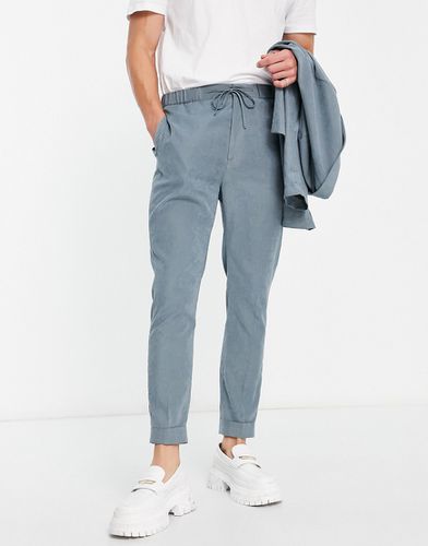 Pantalon de costume fuselé en daim avec taille style jogger - cendré - Asos Design - Modalova