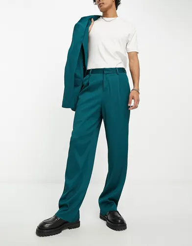 Pantalon de costume large effet plissé - forêt - Asos Design - Modalova