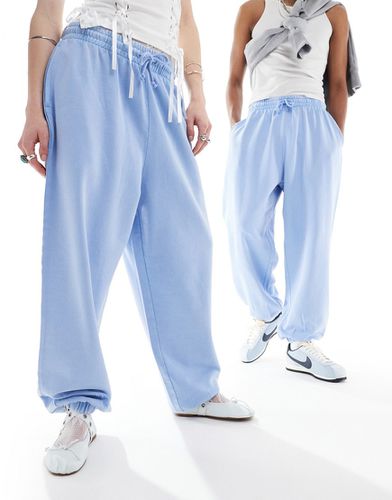 Pantalon de jogging unisexe oversize - jean délavé - Asos Design - Modalova