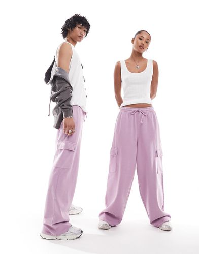 Pantalon de jogging unisexe ample avec poches cargo - Rose délavé - Asos Design - Modalova