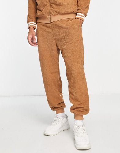 Pantalon de jogging d'ensemble fuselé en tissu éponge avec empiècement - Asos Design - Modalova