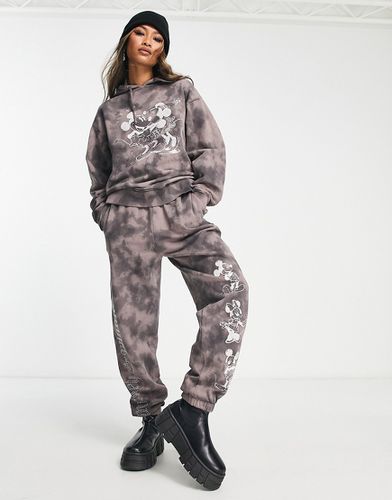 Pantalon de jogging d'ensemble oversize à imprimé graphique Punk Mickey sous licence effet tie-dye foncé - Asos Design - Modalova