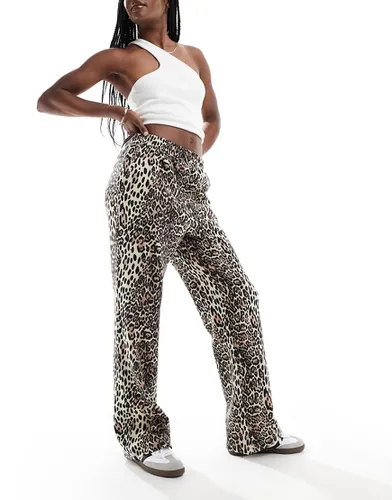 Pantalon de jogging droit - Imprimé léopard - Asos Design - Modalova