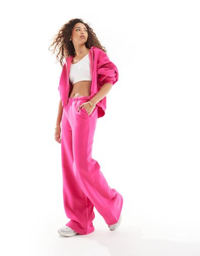 Pantalon de jogging large d'ensemble - Rose - Asos Design - Modalova