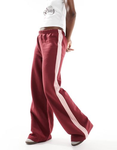 Pantalon de survêtement oversize à bande latérale rose - Bordeaux - Asos Design - Modalova