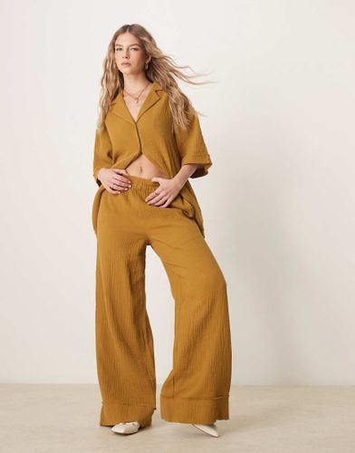 Pantalon d'ensemble  enfiler en gaze de coton avec bords effilochs - Olive - Asos Design - Modalova