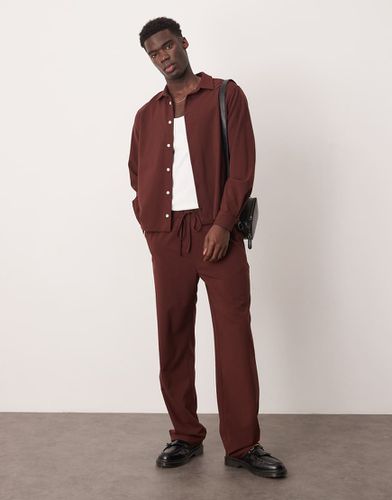 Pantalon d'ensemble baggy - Asos Design - Modalova