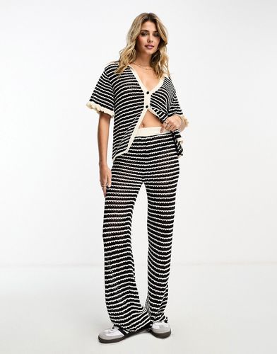 Pantalon d'ensemble large en maille à rayures - Noir et blanc - Asos Design - Modalova