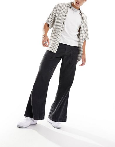 Pantalon évasé en velours côtelé avec détail style western - Asos Design - Modalova