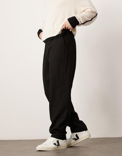 Pantalon habillé oversize fuselé et texturé - Asos Design - Modalova