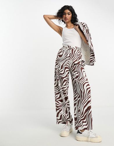 Pantalon large en lin à imprimé animal - Asos Design - Modalova