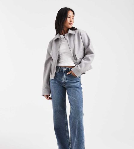 ASOS DESIGN Petite - Jean droit en denim stretch et confortable - Dlavage vintage - Asos Petite - Modalova