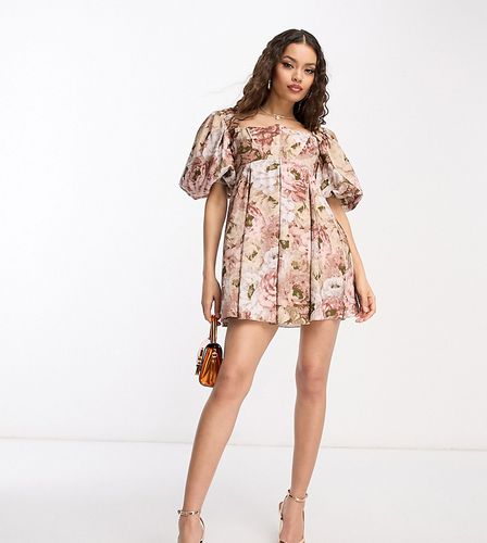 ASOS DESIGN Petite - Robe babydoll courte à imprimé fleuri avec manches bouffantes et buste ondoyant - Asos Petite - Modalova