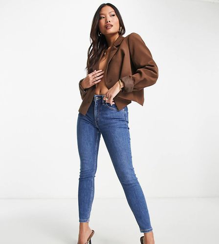 ASOS DESIGN Petite - Ultimate - Jean skinny - moyen authentique - Asos Petite - Modalova