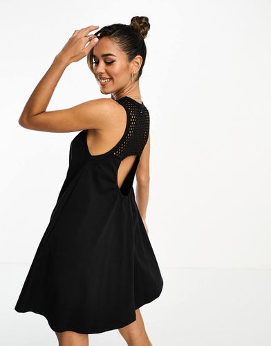 Robe courte sans manches avec partie supérieure en maille au crochet - Asos Design - Modalova