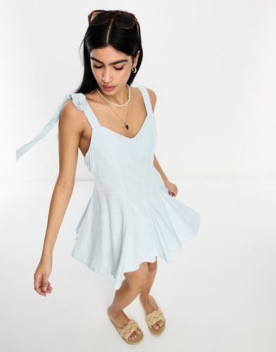 Robe d'été courte fluide en lin avec liens à nouer et godets - Asos Design - Modalova