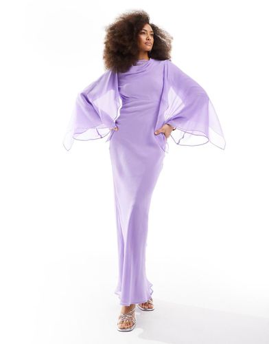 Robe longue coupée en biais en mousseline avec mancherons et détail cape - Lilas - Asos Design - Modalova