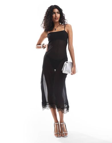 Robe longue en mousseline transparente avec bordure en dentelle - Asos Design - Modalova