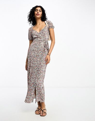 Robe portefeuille plissée mi-longue à petites fleurs avec manches courtes et lien noué sur le côté - Noir - Asos Design - Modalova