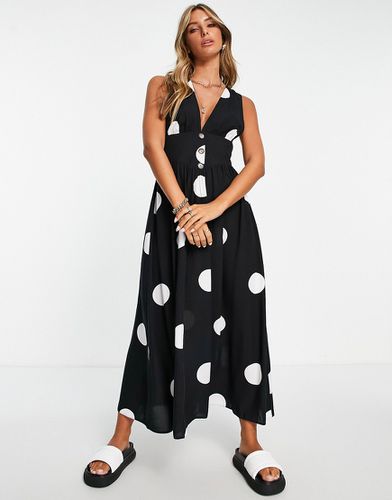 Robe salopette mi-longue à décolleté plongeant et à pois - Noir et blanc - Asos Design - Modalova