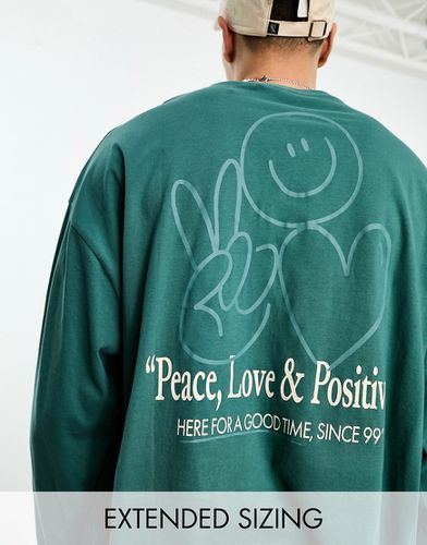 T-shirt manches longues oversize avec imprimé Peace au dos - Vert - Asos Design - Modalova