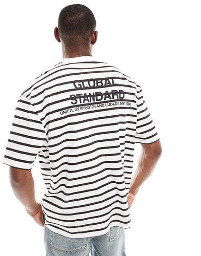 T-shirt oversize avec imprimé texte au dos et rayures - Asos Design - Modalova