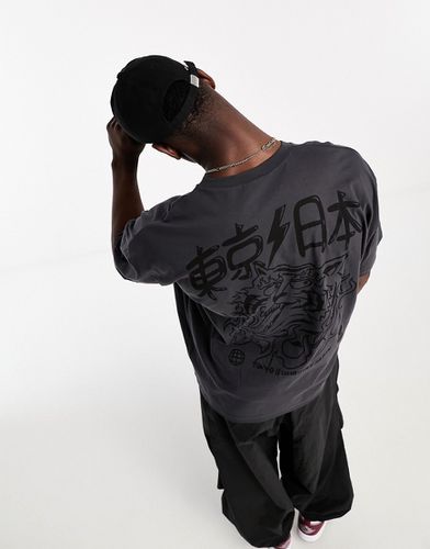 T-shirt oversize avec imprimés tigre et Tokyo à l'avant et au dos - délavé - Asos Design - Modalova