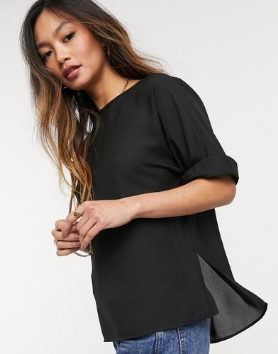 T-shirt oversize avec fini tissé​​​​​​​ et manches retroussées - Noir - Asos Design - Modalova