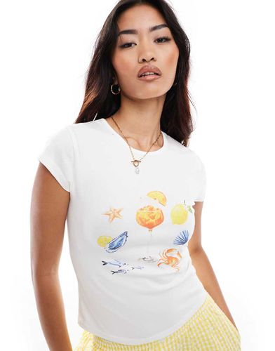 T-shirt rétréci avec imprimé vacances - Asos Design - Modalova