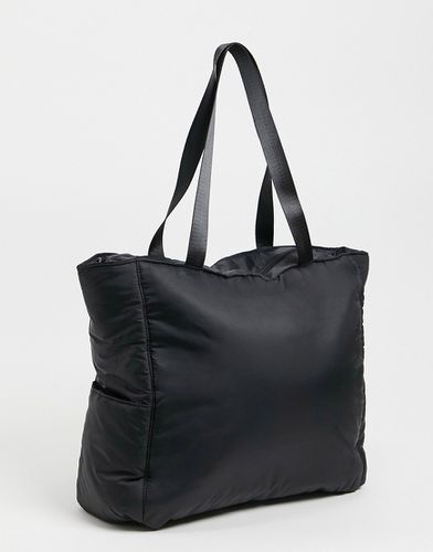 Tote bag matelassé en nylon avec poches latérales - ASOS DESIGN - Modalova