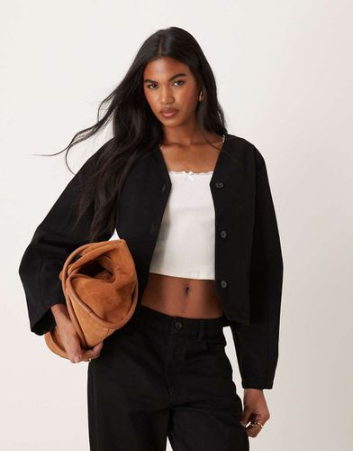 Veste en jean surpiquée à manches façonnées - Asos Design - Modalova