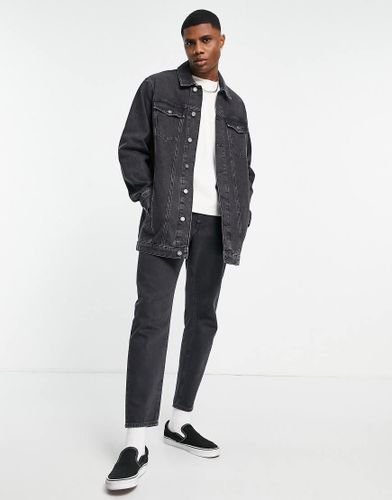 Veste longue en jean style années 70- délavé - Asos Design - Modalova