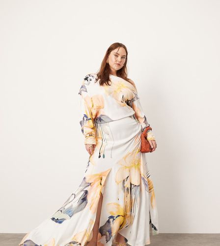 Curve - Robe longue à épaule tombante et imprimé fleurs flou - Asos Edition - Modalova