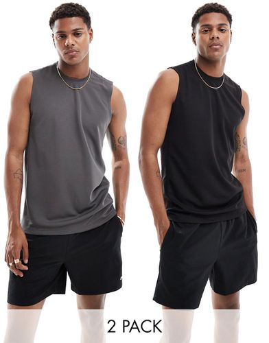 Icon - Lot de 2 t-shirts de sport sans manches en tissu à séchage rapide - Noir/anthracite - Asos 4505 - Modalova