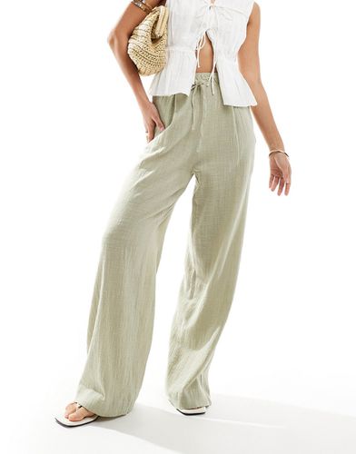 Pantalon texturé style rustique en lin avec liens à la taille - Kaki clair - Bershka - Modalova