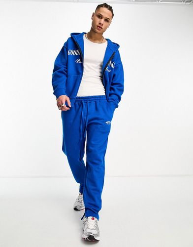 Pantalon de jogging droit d'ensemble avec logo imprimé et ourlet fendu - de cobalt - Good For Nothing - Modalova