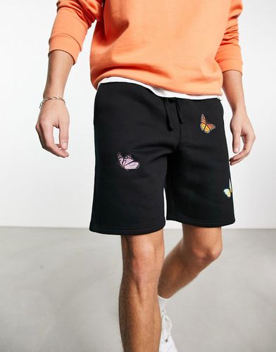 Short en jersey à imprimés papillons placés - Noir - Good For Nothing - Modalova